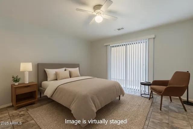a kitchen with stainless steel appliances granite countertop furniture a sink and a refrigerator