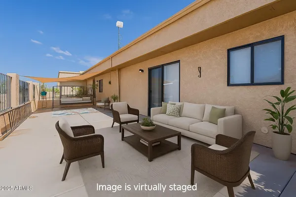 a bathroom with a sink toilet and a mirror