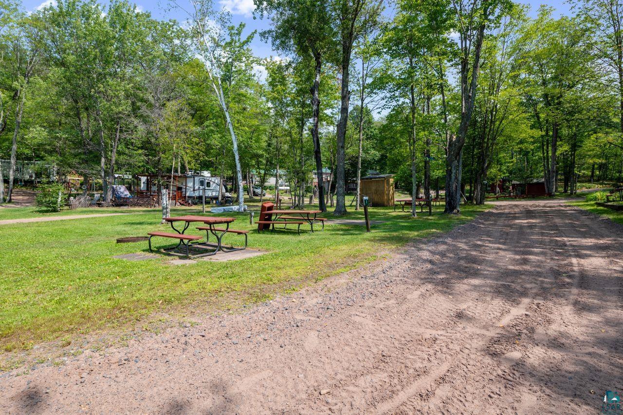 9505 Wildwood Campground Road Iron River, WI 54847 - Photo 15 of 34 View of home's community featuring a lawn