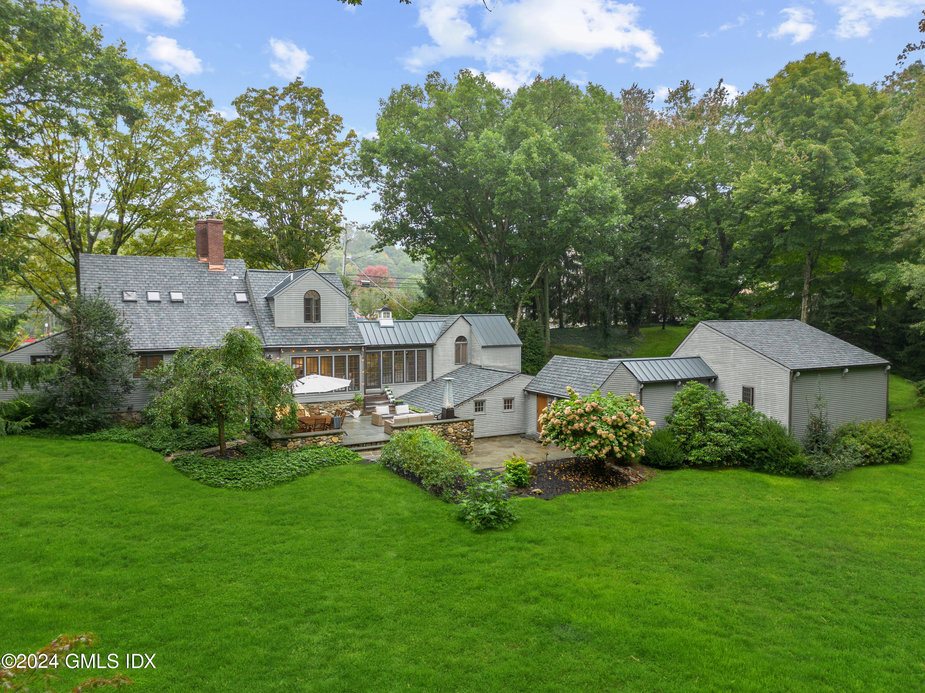 9 Webbs Hill Road Stamford, CT 06903 - Photo 31 of 38 an aerial view of a house with a garden