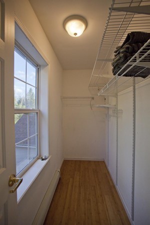 408 Bridge Road, Unit B Northampton, MA 01062 - Photo 20 of 22 a view of a room with wooden floor and windows