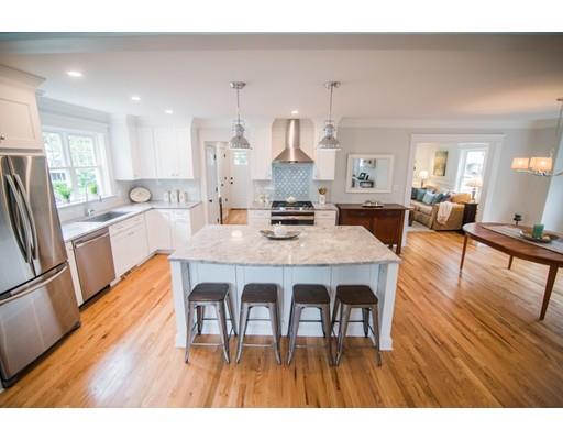 25 Lawton Road Needham, MA 02492 - Photo 11 of 34 a view of a dining room with furniture and wooden floor