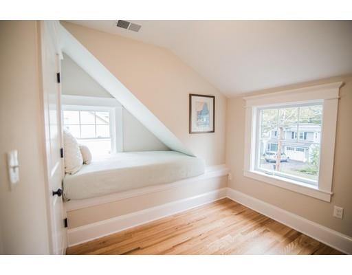 25 Lawton Road Needham, MA 02492 - Photo 29 of 34 a view of empty room with wooden floor and fan