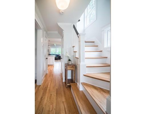 25 Lawton Road Needham, MA 02492 - Photo 3 of 34 a view of a hallway with wooden floor and staircase