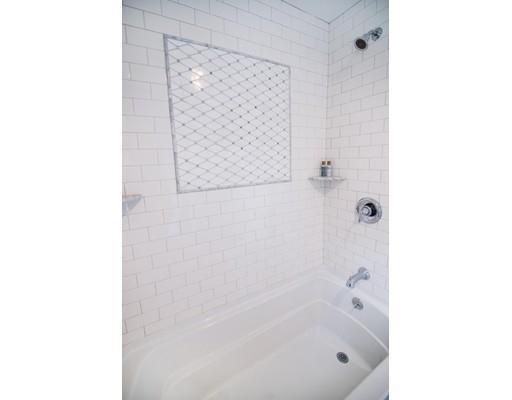 25 Lawton Road Needham, MA 02492 - Photo 31 of 34 a bathroom with a bathtub