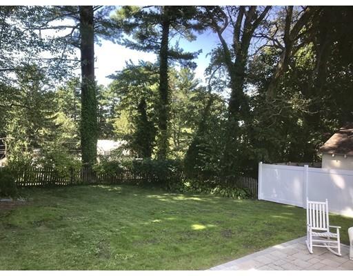 25 Lawton Road Needham, MA 02492 - Photo 32 of 34 a backyard of a house with lots of green space
