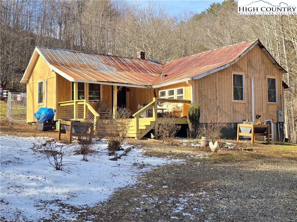 325 Sawyers Road Warrensville, NC 28693 - Photo 39 of 39 a view of a house with backyard