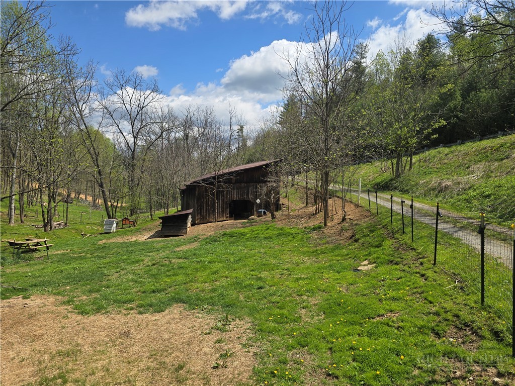 325 Sawyers Road Warrensville, NC 28693 - Photo 5 of 39 a view of a garden