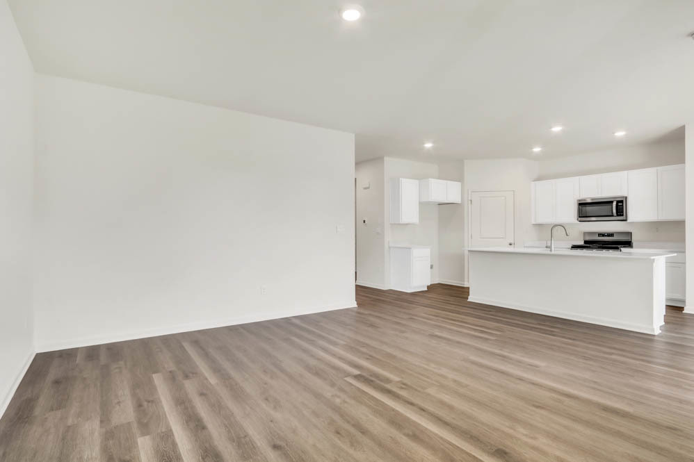 25504 West Veranium Drive Plainfield, IL 60544 - Photo 12 of 22 a view of kitchen with wooden floor and window