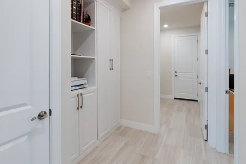 a view of a swimming pool and outdoor seating