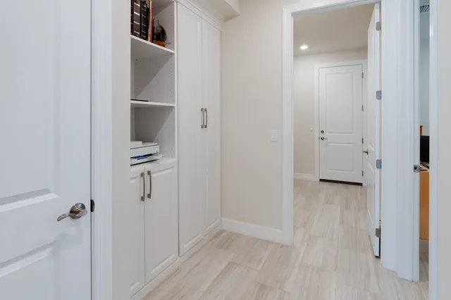 a view of a swimming pool and outdoor seating