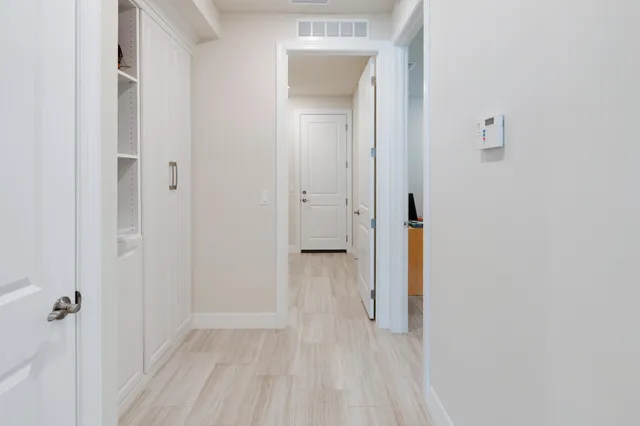 a front view of a house with a yard table and chairs