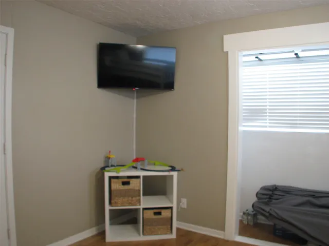 a room with a flat screen tv