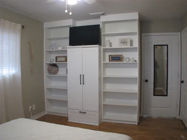 a view of a livingroom with a flat screen tv