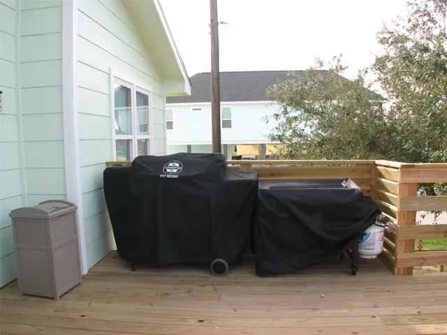 a view of balcony with furniture