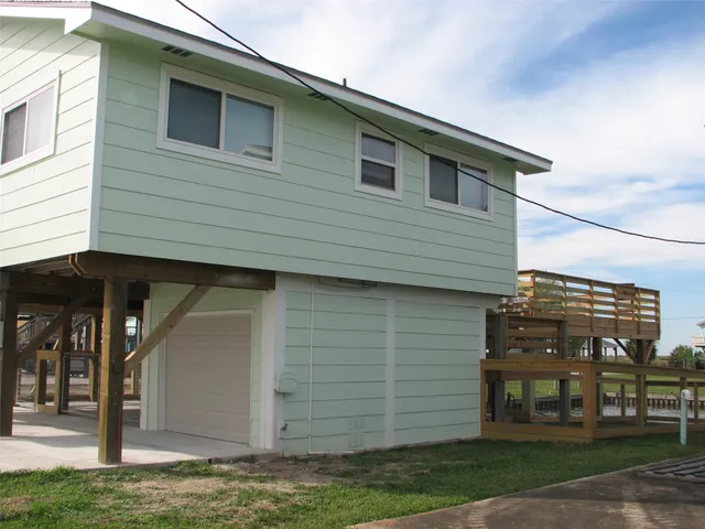 a front view of a house with a garage
