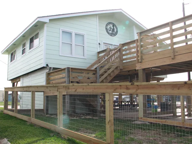 a front view of house with an outdoor seating