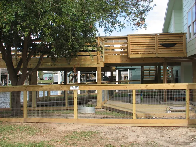 a view of a backyard with sitting area