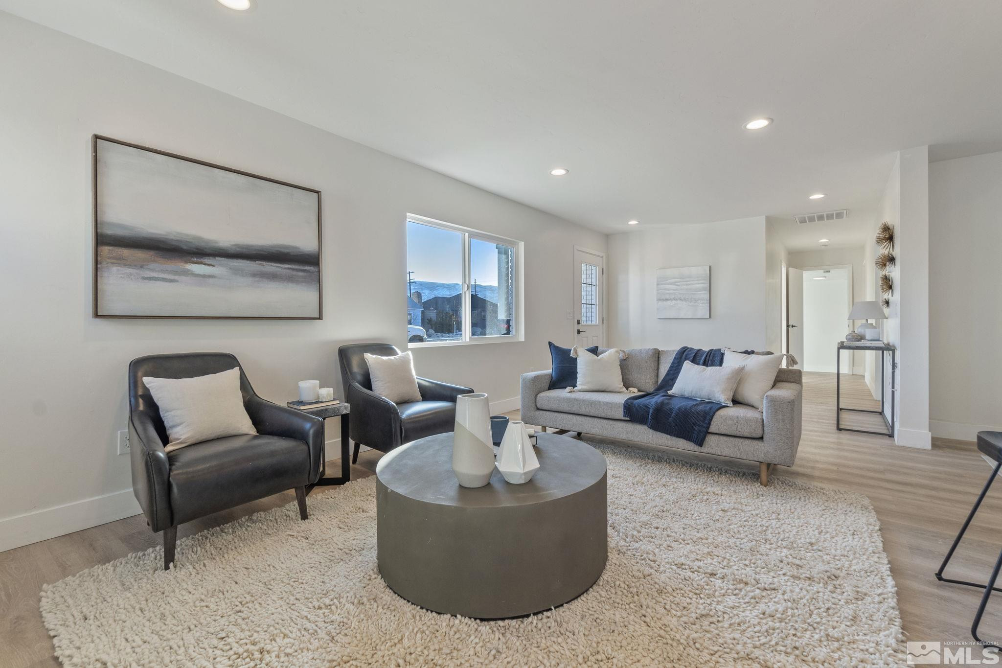 711 Balzar Circle Reno, NV 89502 - Photo 11 of 35 a living room with furniture and a large window
