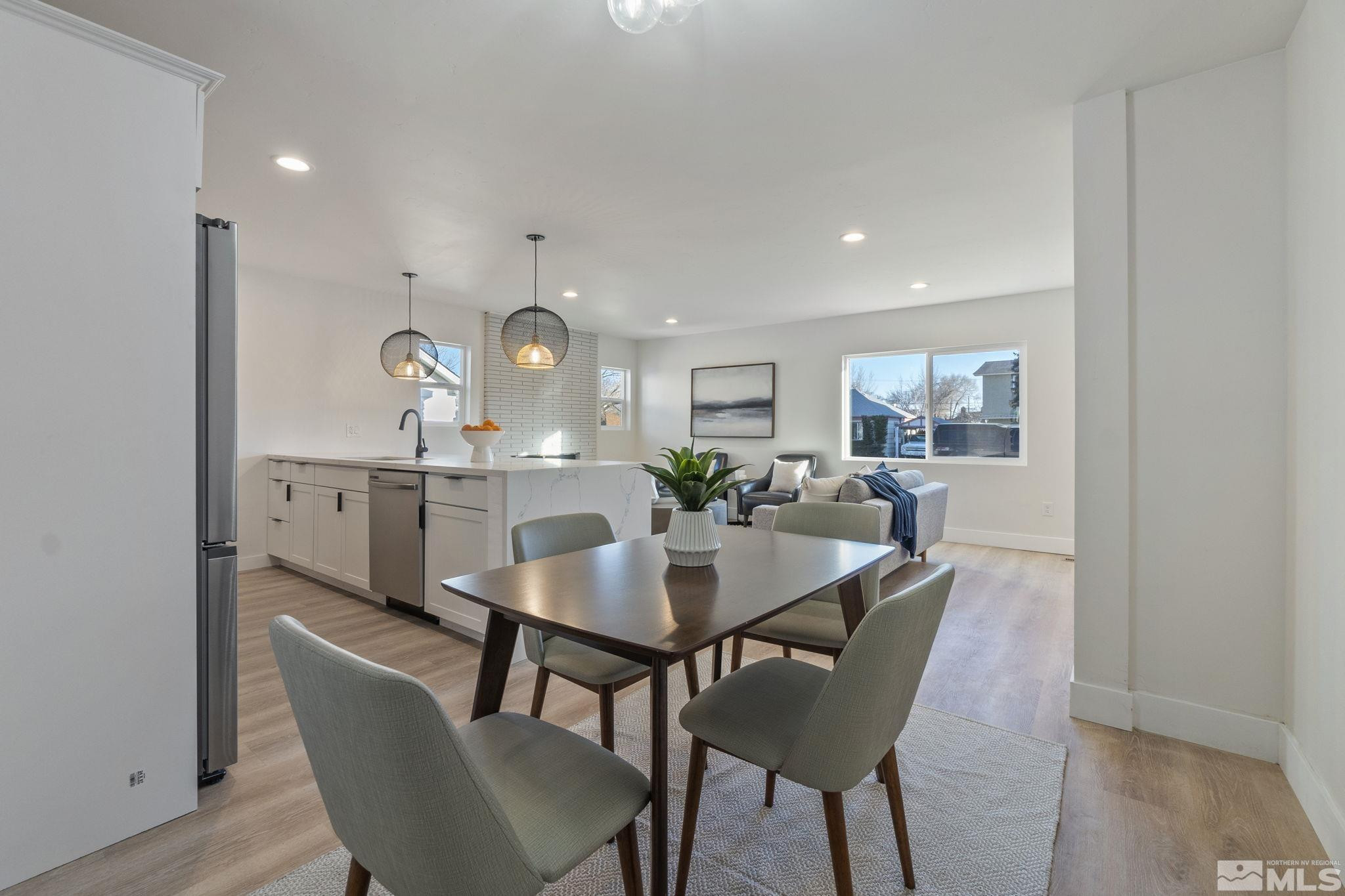 711 Balzar Circle Reno, NV 89502 - Photo 21 of 35 a view of a dining room with furniture and wooden floor
