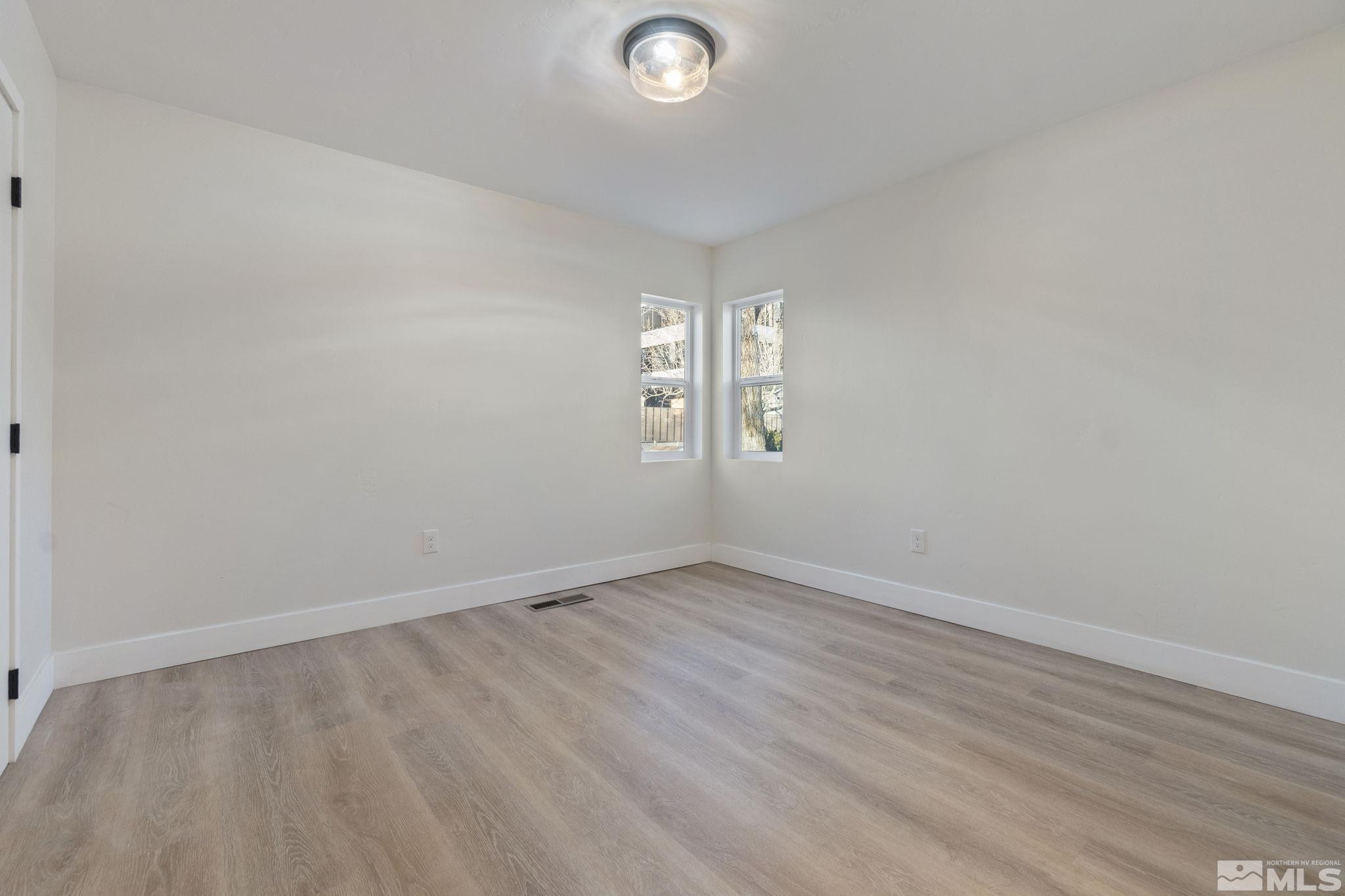 711 Balzar Circle Reno, NV 89502 - Photo 27 of 35 wooden floor in an empty room