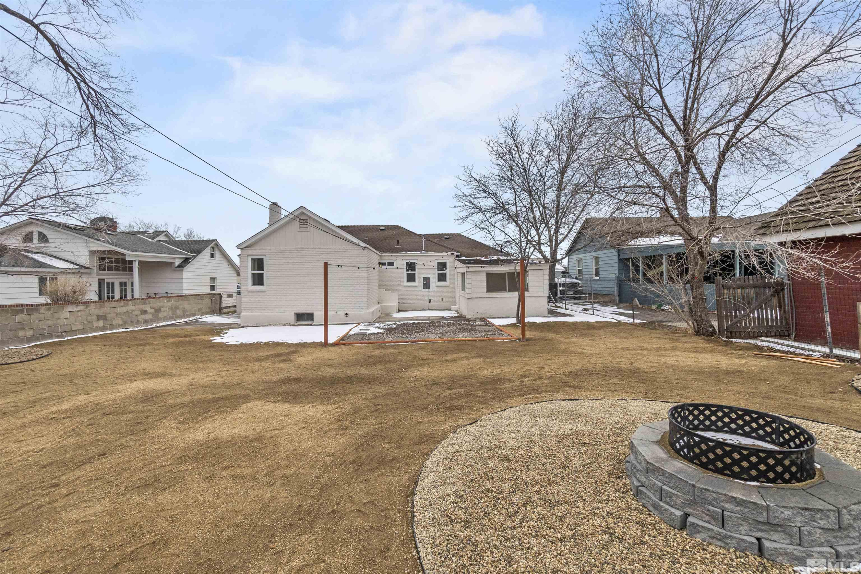 711 Balzar Circle Reno, NV 89502 - Photo 33 of 35 a view of a white house with a yard