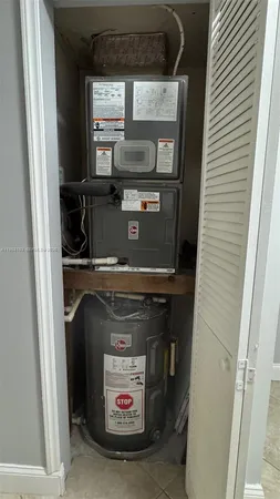 a utility room with washer and dryer