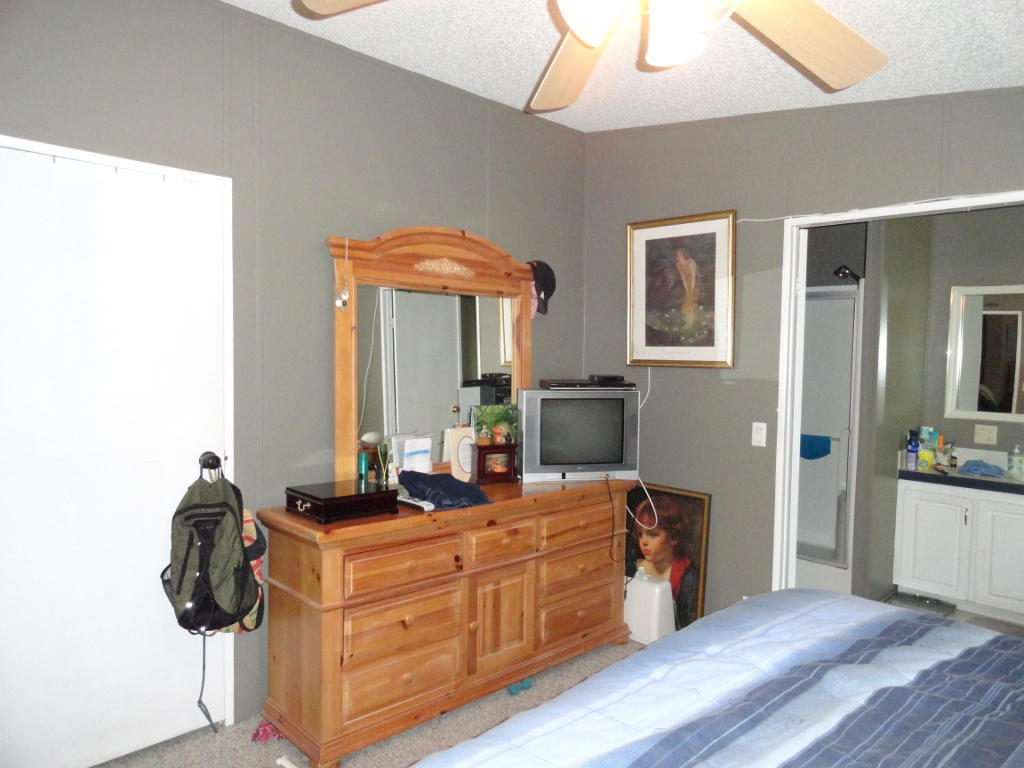 339 East Nursery Road Santa Rosa Beach, FL 32459 - Photo 17 of 32 a room with furniture and wooden floor