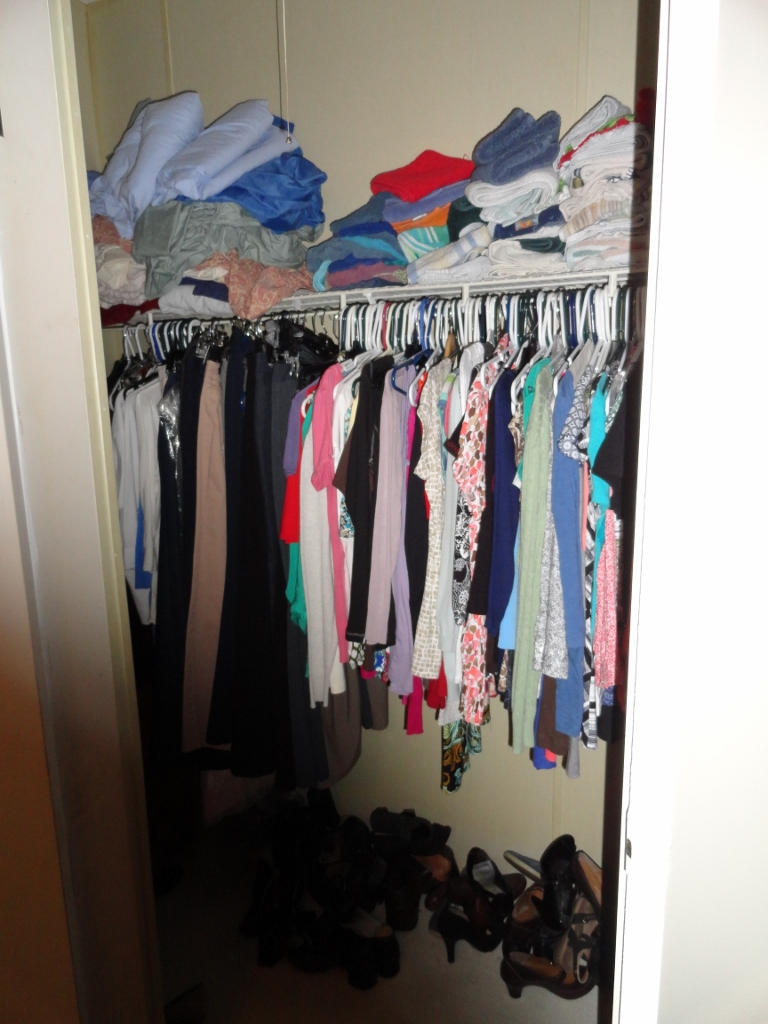 339 East Nursery Road Santa Rosa Beach, FL 32459 - Photo 18 of 32 a view of walk in closet with clothes and shoes