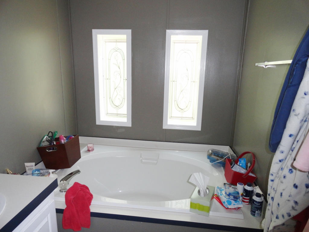 339 East Nursery Road Santa Rosa Beach, FL 32459 - Photo 20 of 32 a bath tub sitting next to a window