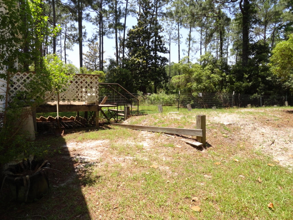 339 East Nursery Road Santa Rosa Beach, FL 32459 - Photo 25 of 32 a view of back yard of the house
