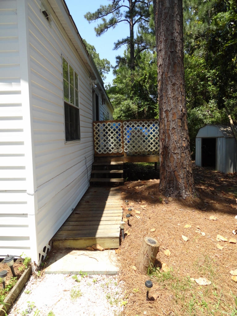 339 East Nursery Road Santa Rosa Beach, FL 32459 - Photo 26 of 32 a view of a pathway of a house