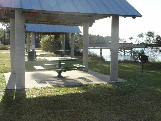 339 East Nursery Road Santa Rosa Beach, FL 32459 - Photo 29 of 32 a view of a porch with a yard