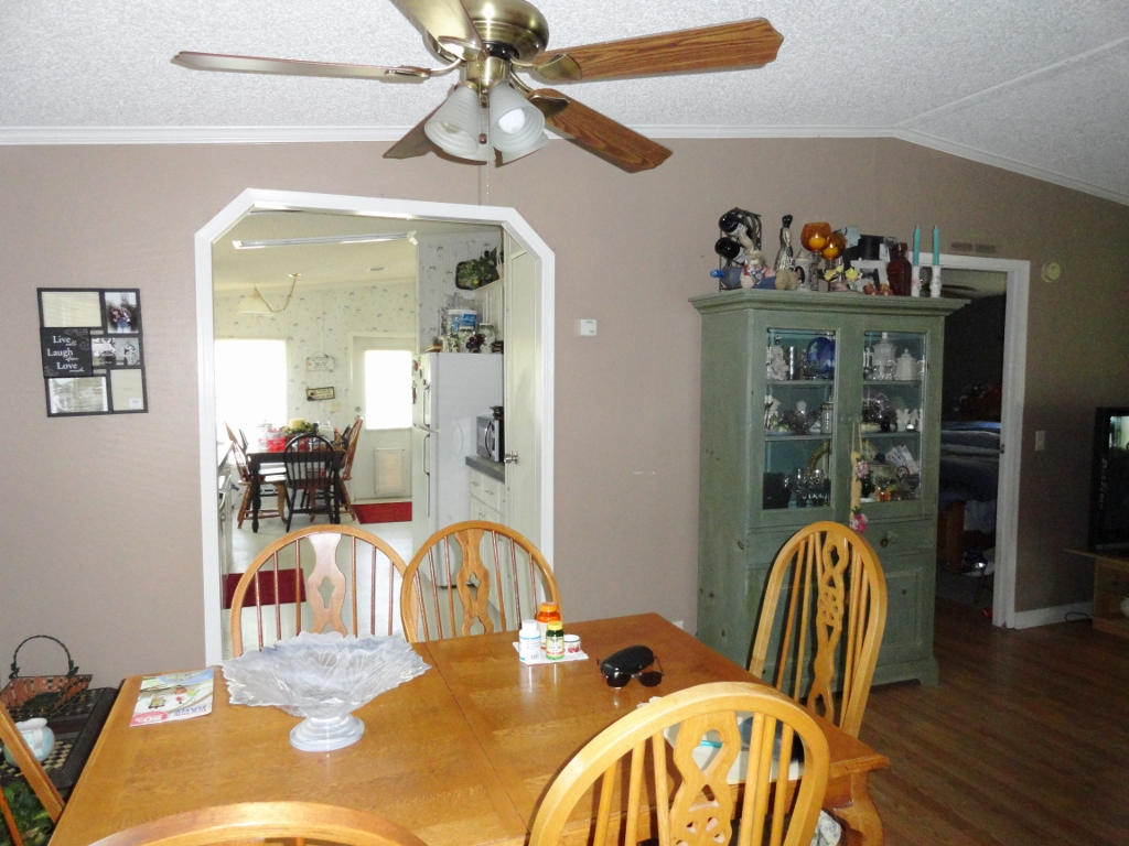 339 East Nursery Road Santa Rosa Beach, FL 32459 - Photo 8 of 32 a dining room with furniture and wooden floor