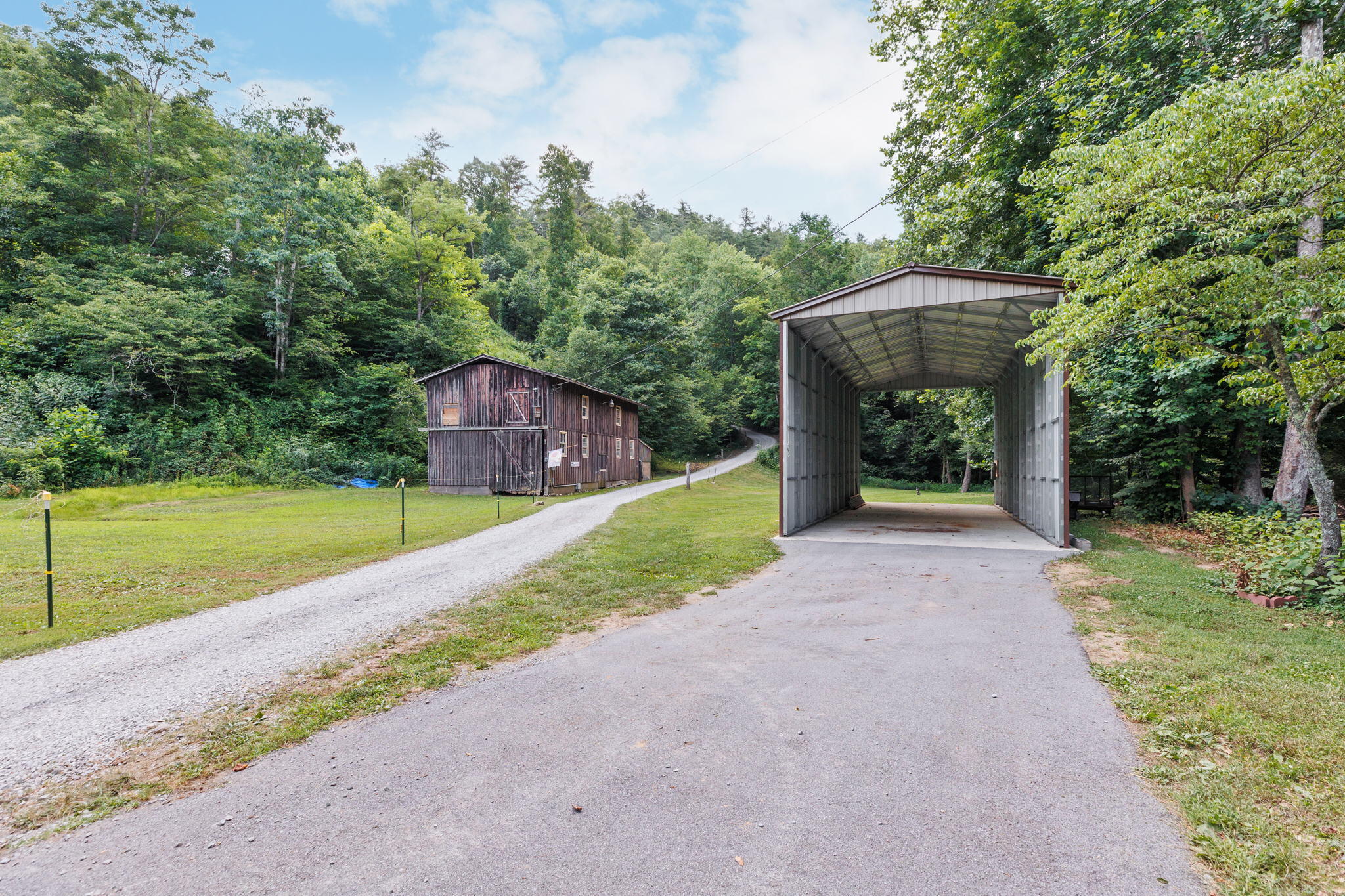 300 Nolan Ridge Road Erwin, TN 37650 - Photo 2 of 40 Gravel drive heading to house