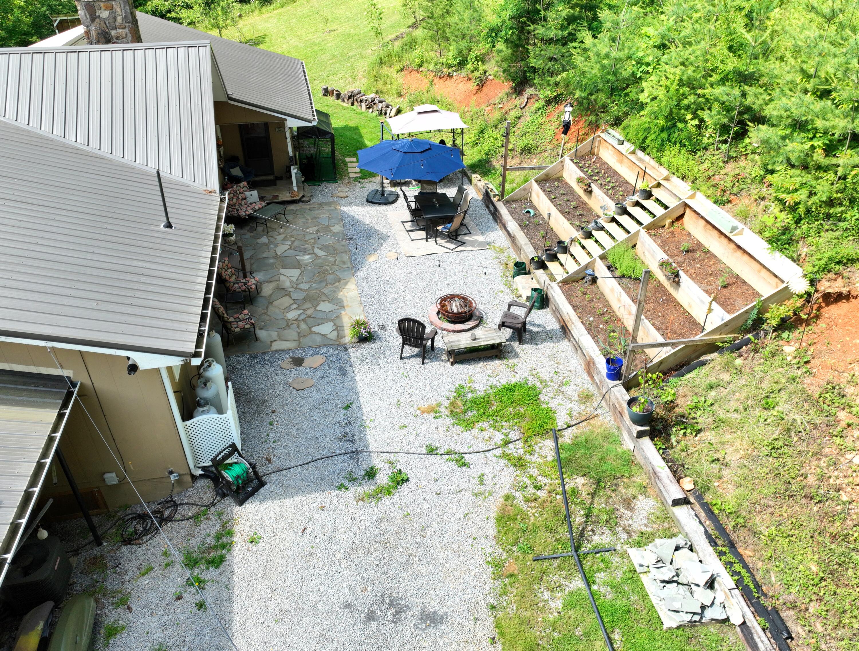 300 Nolan Ridge Road Erwin, TN 37650 - Photo 25 of 40 Rear Year Patio with Garden