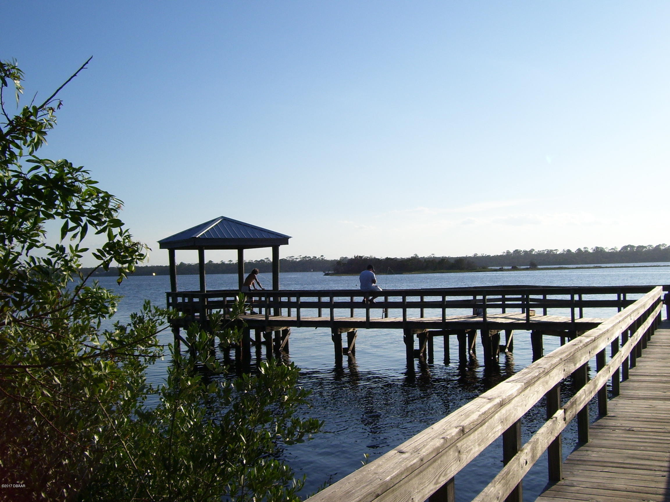 61 Rivocean Drive Ormond Beach, FL 32176 - Photo 20 of 23 a view of a balcony with chairs