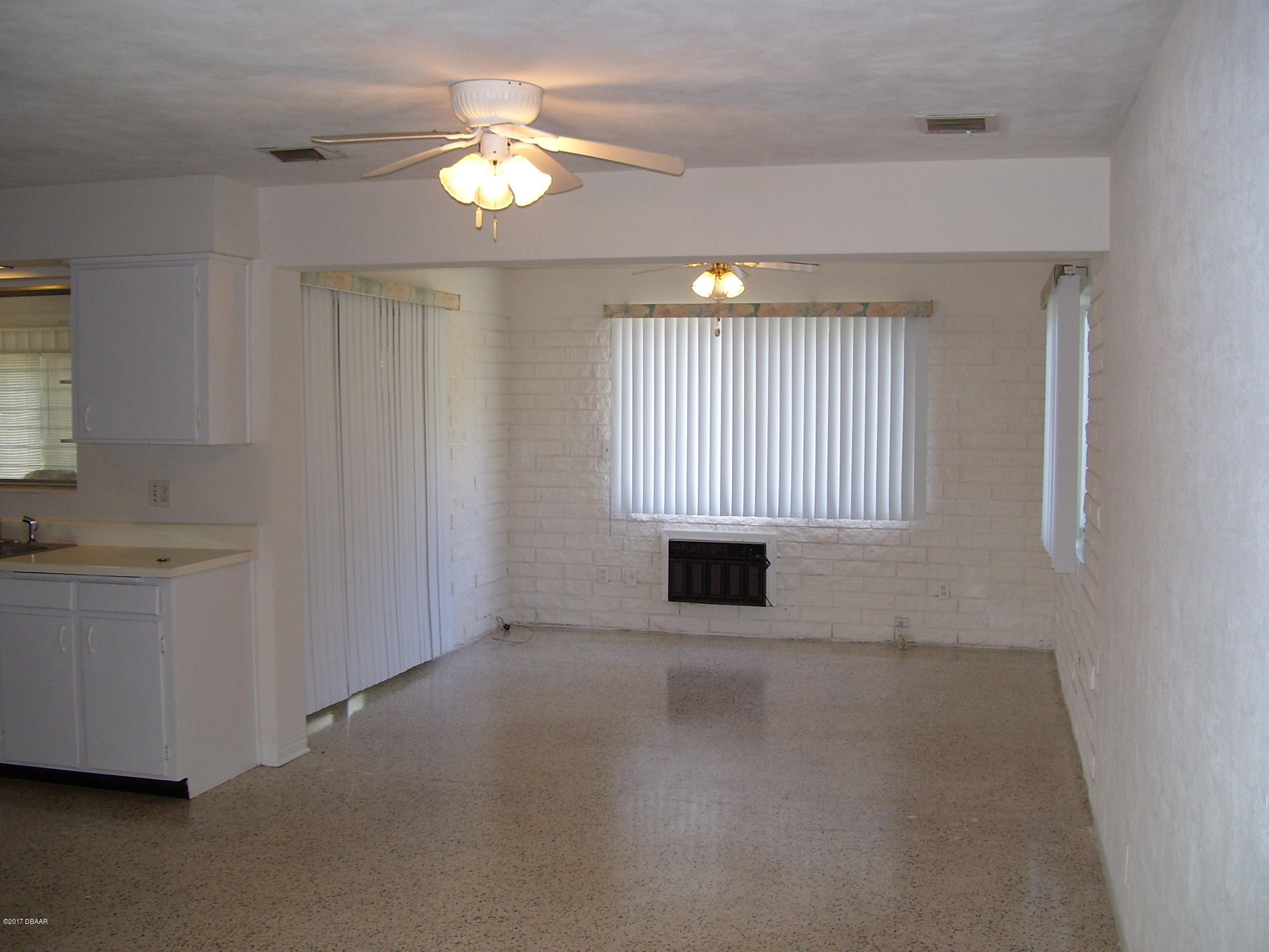 61 Rivocean Drive Ormond Beach, FL 32176 - Photo 4 of 23 a view of an empty room with a window