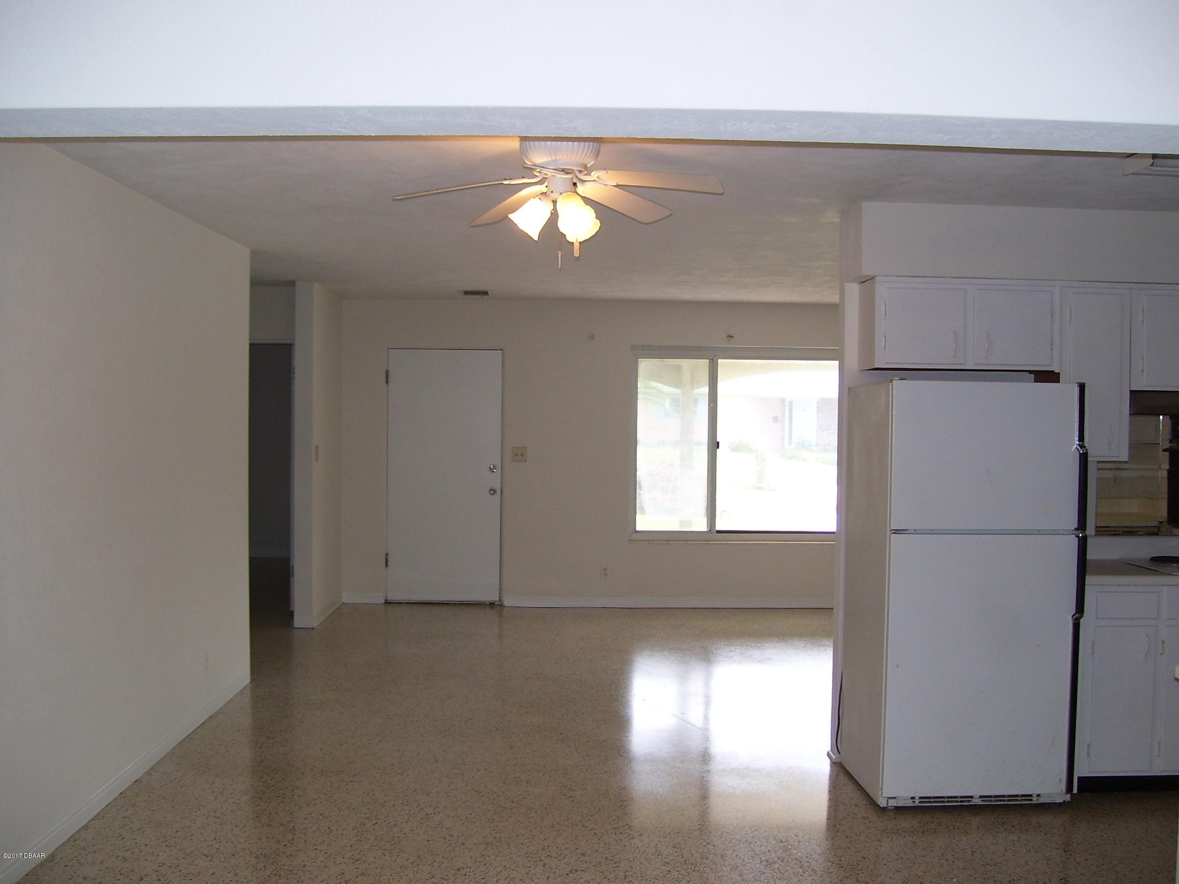 61 Rivocean Drive Ormond Beach, FL 32176 - Photo 5 of 23 a view of empty room with window