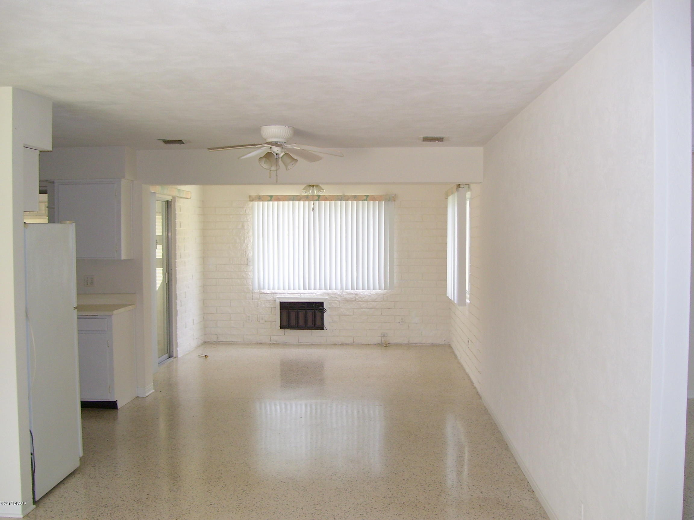 61 Rivocean Drive Ormond Beach, FL 32176 - Photo 6 of 23 a view of an empty room with a window