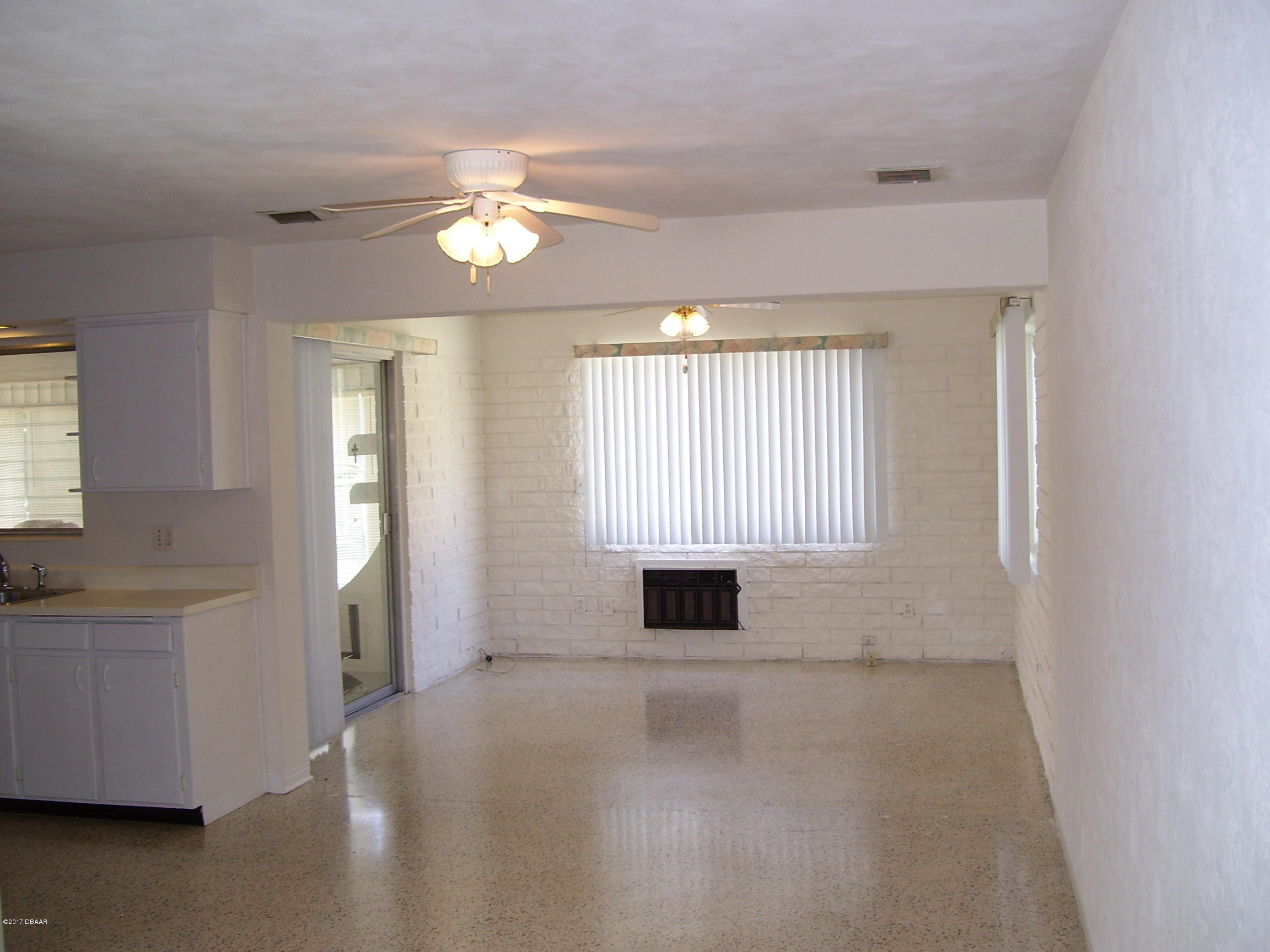 61 Rivocean Drive Ormond Beach, FL 32176 - Photo 8 of 23 a view of an empty room with a window