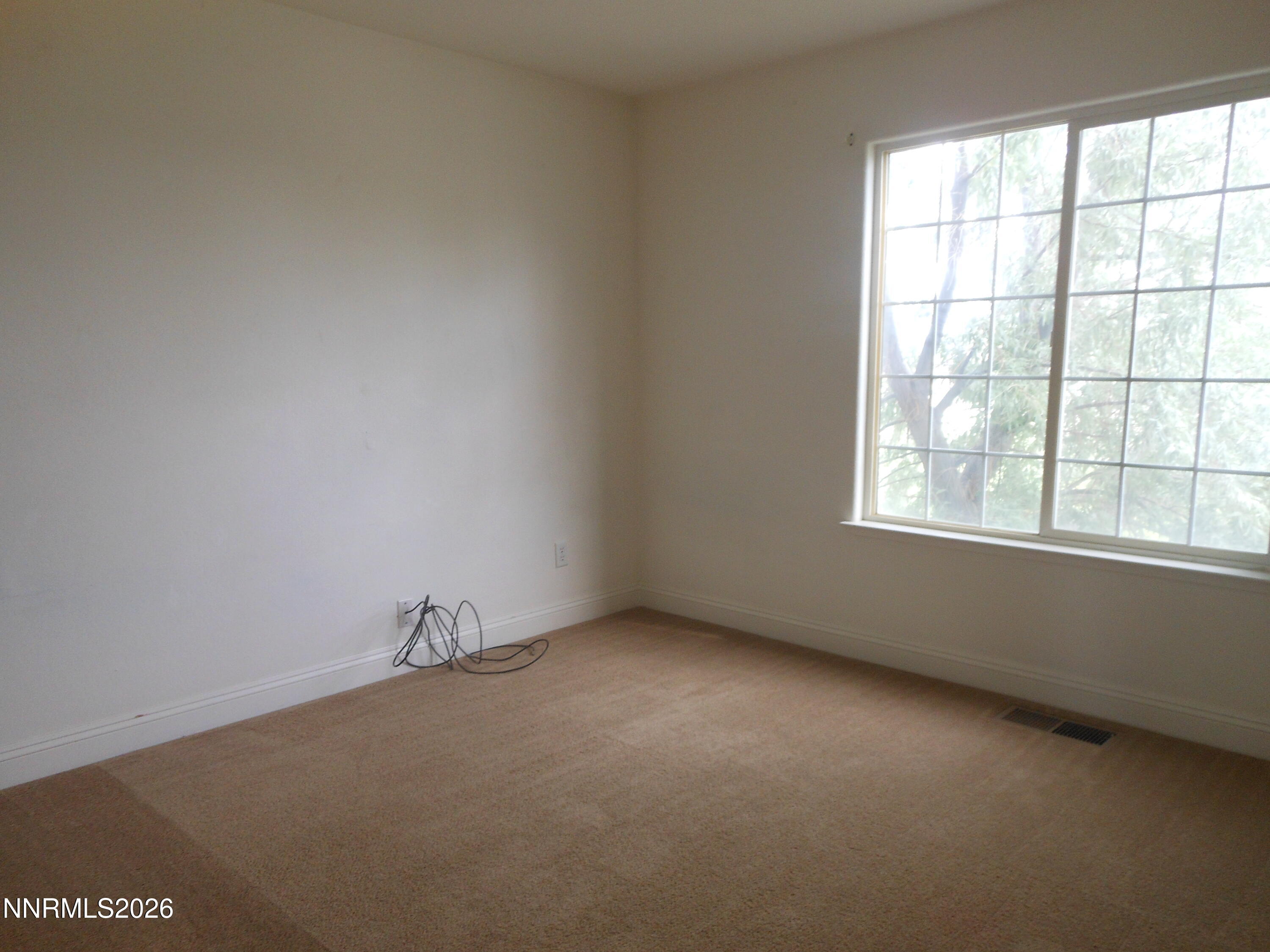 170 Winchester Road Fallon, NV 89406 - Photo 12 of 13 an empty room with a window