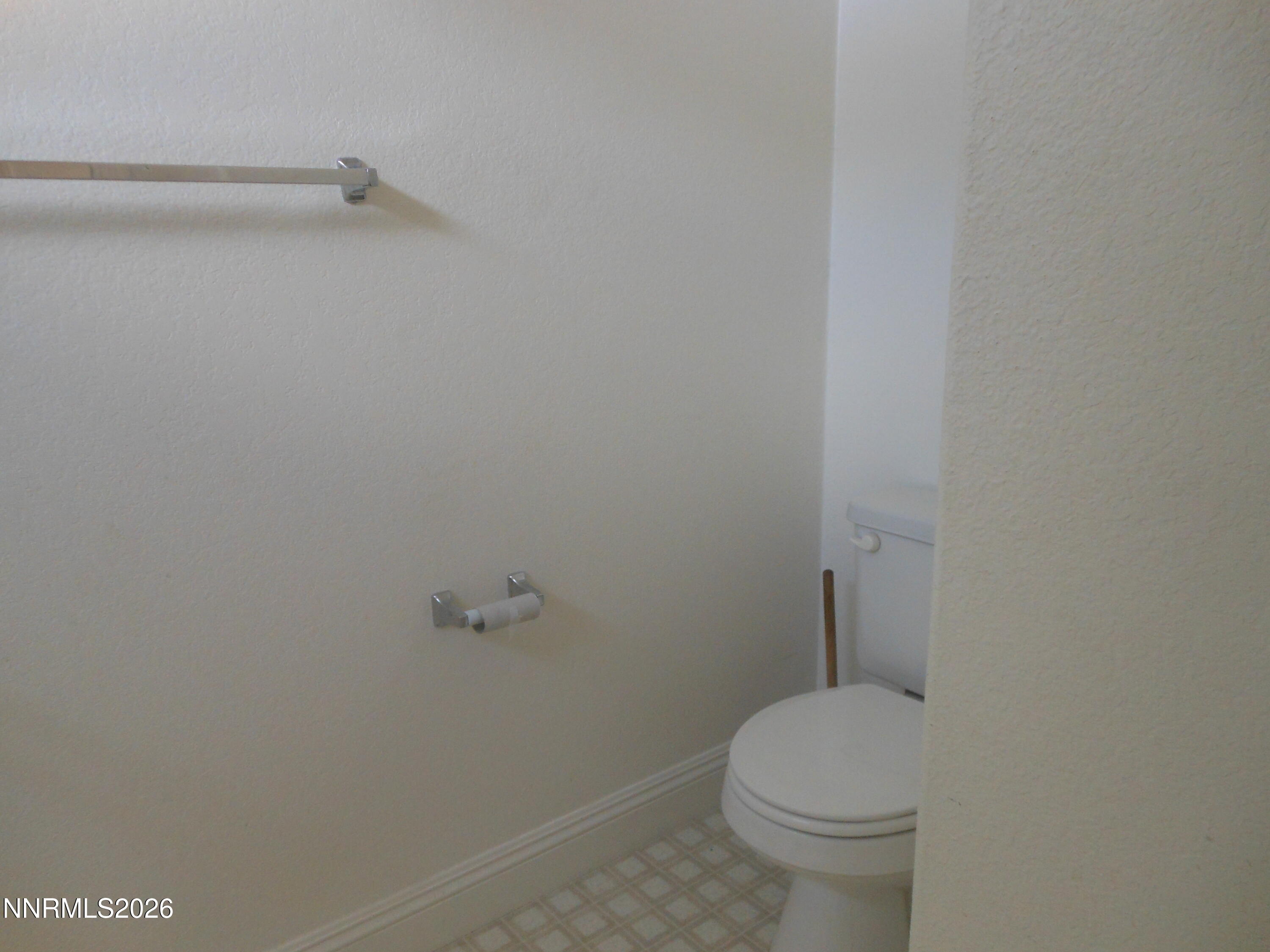 170 Winchester Road Fallon, NV 89406 - Photo 9 of 13 a white toilet sitting next to a shower
