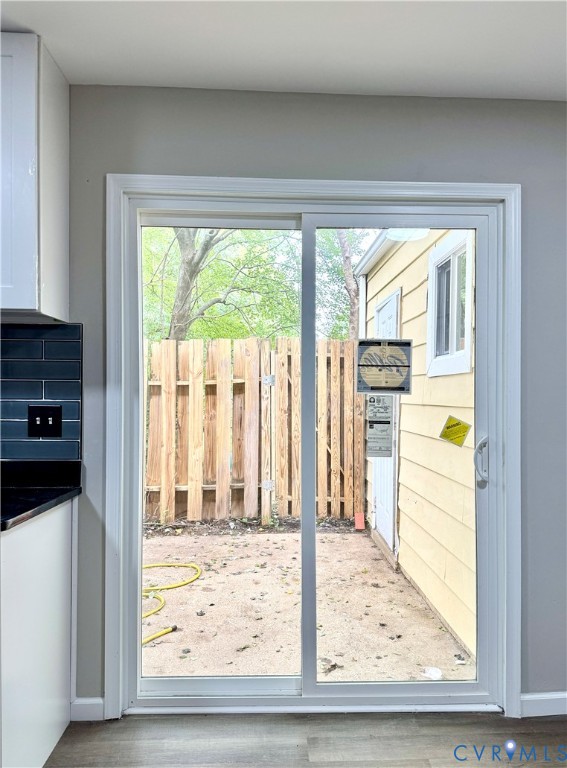 403 Roxana Road Henrico, VA 23075 - Photo 36 of 42 Sliding glass door leading to a private outdoor ar