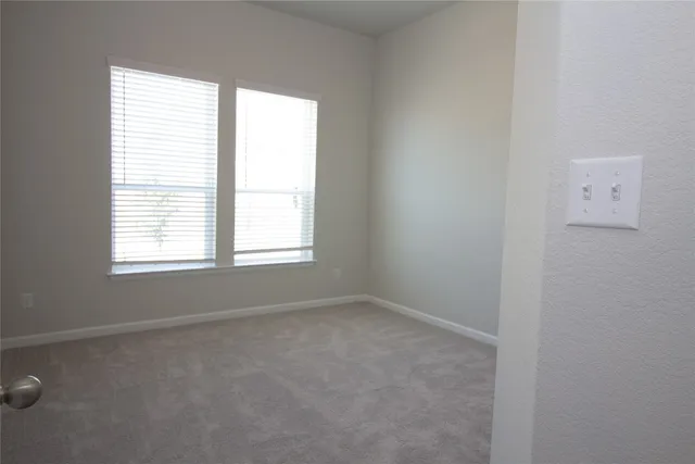 an empty room with a window