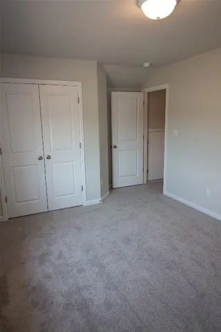 a bathroom with a sink toilet vanity and shower