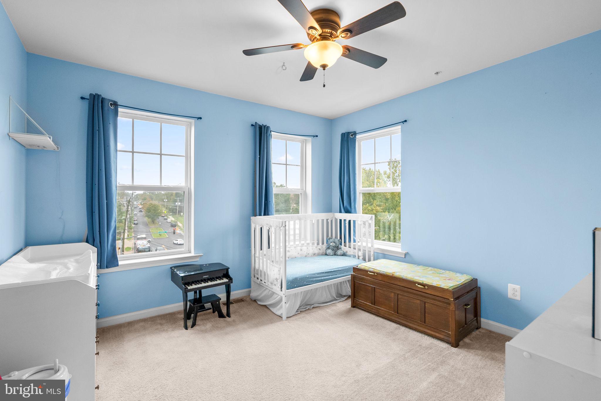 2701 Pinebrook Road Hyattsville, MD 20785 - Photo 21 of 27 a living room with furniture and a window