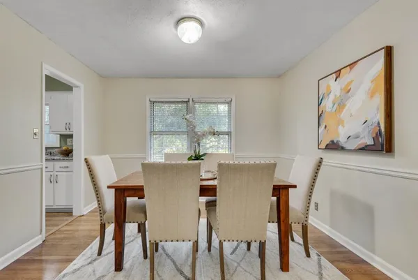 a kitchen with stainless steel appliances a refrigerator sink and microwave