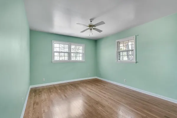 a bathroom with a sink vanity and a mirror