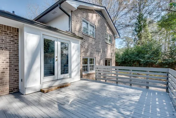 a picture of a bench in front of a microwave